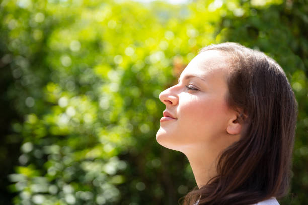 istock Woman Closing Her Eyes 1037080392