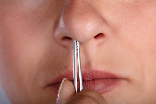 Woman Plucking Her Nose Hair Stock Photo - Download Image Now - Hair, Nose, Removing - iStock Woman Plucking Her Nose Hair Stock Photo - Download Image Now - Hair, Nose, Removing - iStock