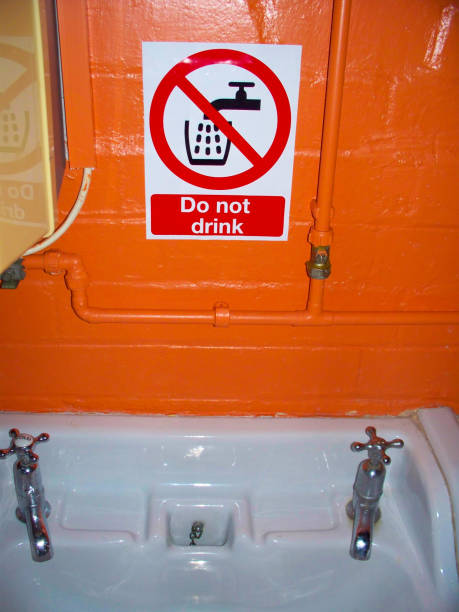 istock Sign Saying 'Do Not Drink' Above a Sink 1037081418