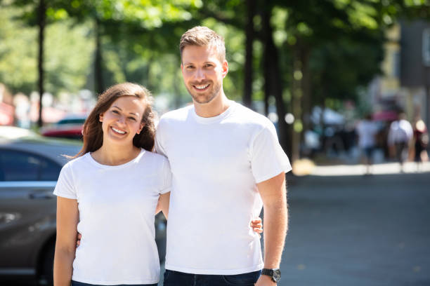 istock Happy Couple Standing On Street 1037083036