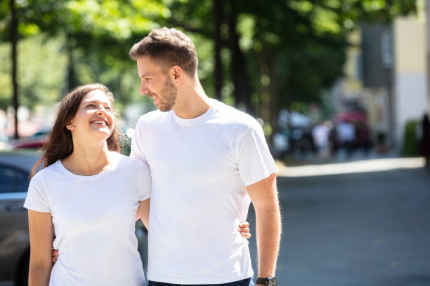 istock Happy Couple Standing On Street 1037083240