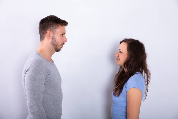 istock Two Businesspeople Looking At Each Other 1037085306