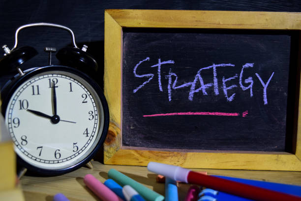 istock Strategy on phrase colorful handwritten on blackboard. 1037090664