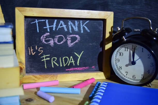 istock Thank god it's friday on phrase colorful handwritten on blackboard. 1037090866