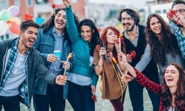 istock Friends on a rooftop party 1037091118