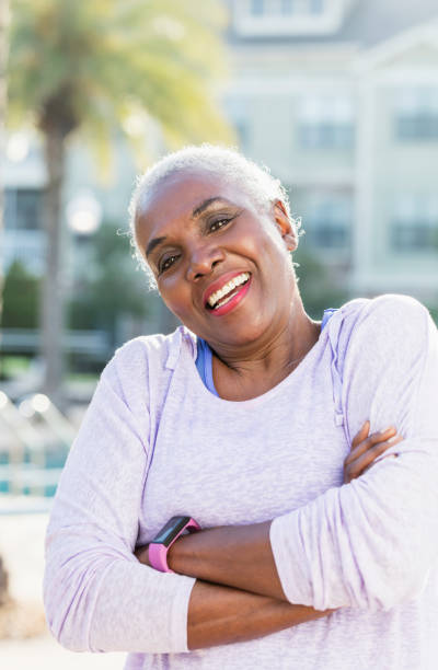 istock Senior African-American woman standing on pool deck 1037095994