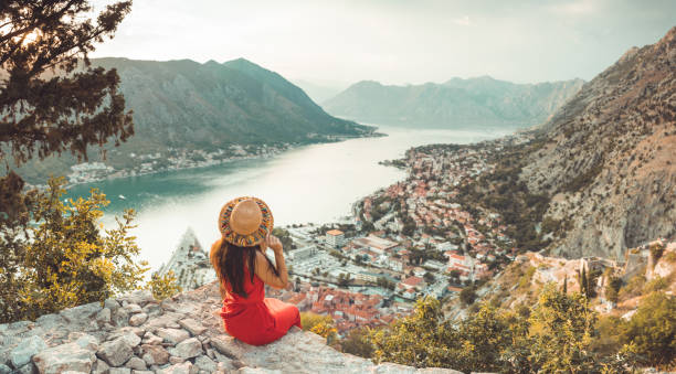 Young Lady Relax on Holiday Young Lady relax over Kotor, Montenegro Holiday  destination hvar photos stock pictures, royalty-free photos & images