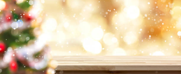 istock Blur colorful Christmas tree and gold bokeh with table top 1037155626