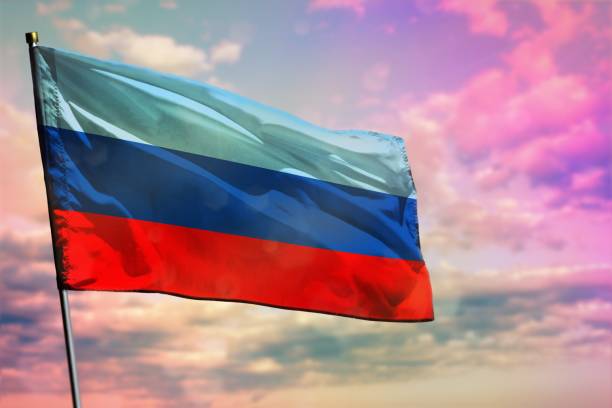 Fluttering Luhansk Peoples Republic flag on colorful cloudy sky background. Prosperity concept. Fluttering Luhansk Peoples Republic flag on colorful cloudy sky background. Luhansk Peoples Republic prospering concept. eastern ukraine stock pictures, royalty-free photos & images