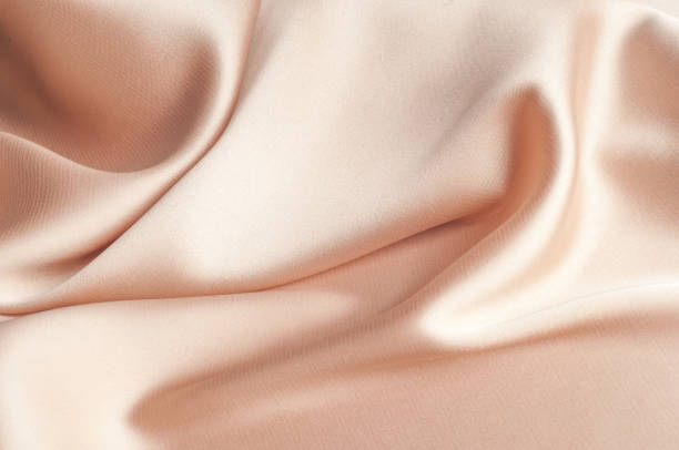 istock tissue, textile, cloth, fabric, material, texture. beige color 1037164648