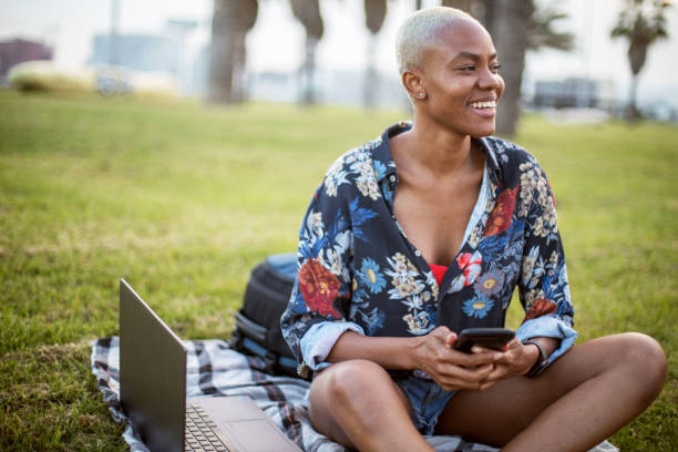 istock Smiling short hair woman using mobile phone. 1037166780