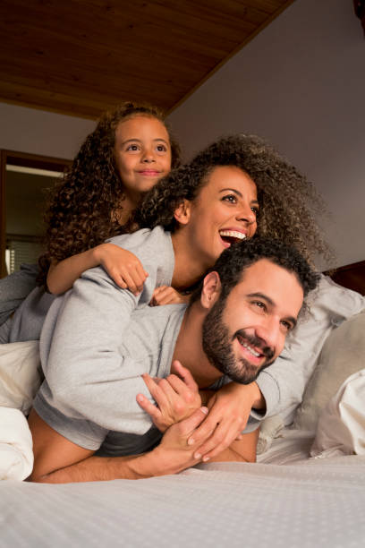istock Family playing in bed 1037175854