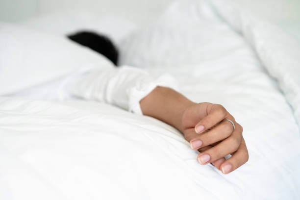 istock Young man sleep in bed in the bedroom. 1037182966