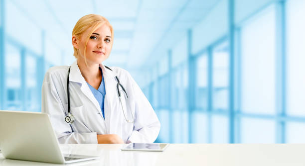 istock Doctor using laptop computer at the hospital. 1037184596