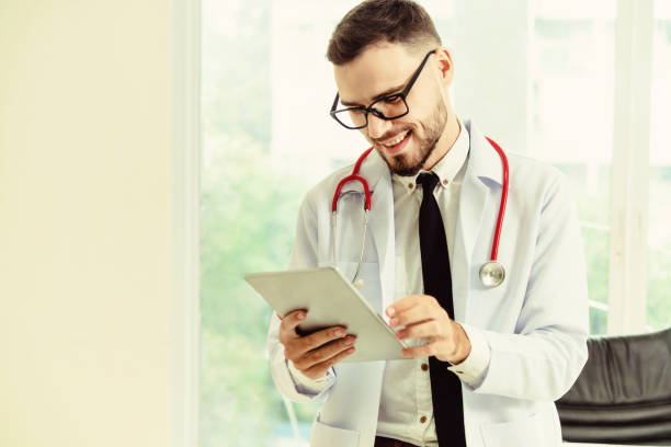 istock Doctor working on tablet computer in the hospital. 1037185010