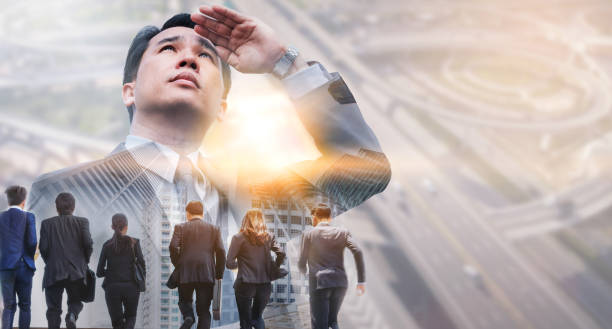 istock Double exposure - Business Leader and Team. 1037188494