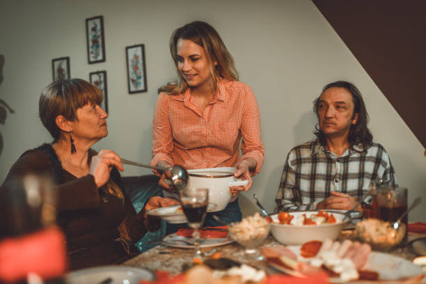 istock Multi-generational family celebrating thanksgiving at home 1037191950