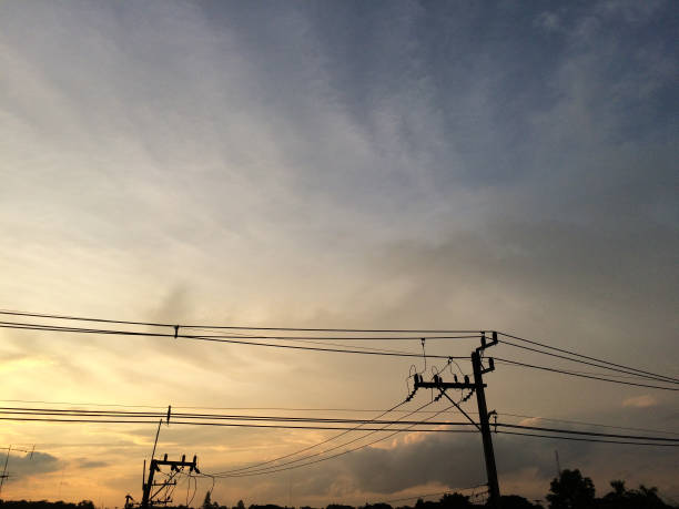 istock electric cable on morning sunrise sky 1037199770