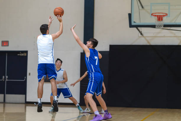 istock High school basketball scrimmage 1037205086