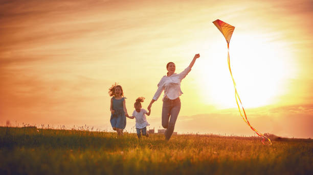 istock family playing outdoor 1037250100