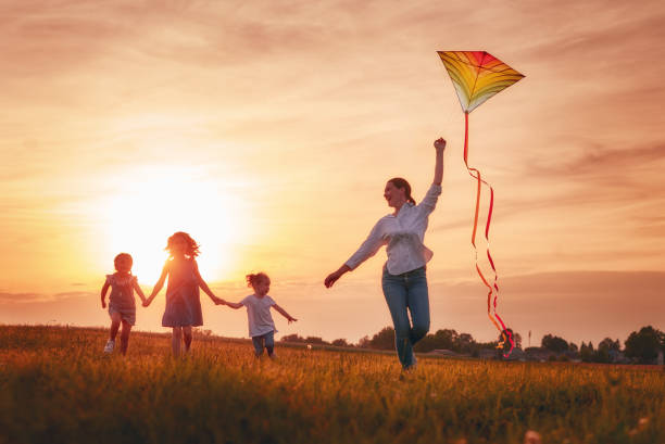 istock family playing outdoor 1037250108