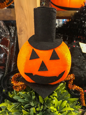 Jack o'lantern decoration with witch's hat