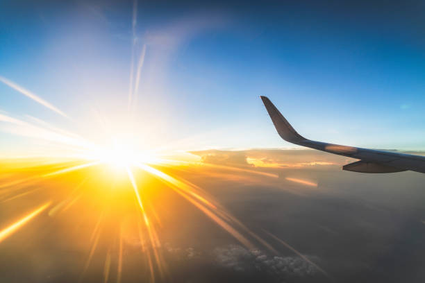 istock Traveling by plane, the sunset is beautiful outside 1037273140