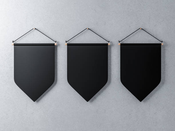 Three Black pennants hanging on a concrete wall, 3d rendering