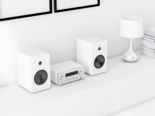 istock Modern audio stereo system with white speakers on bureau 1037291900