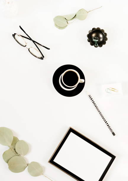istock Creative home office desk workspace, composition mock up,  cup of coffee, keyboard, blanket,  eucalyptus branches, different subjects on white background. Flat lay, top view.Copy space. 1037296056