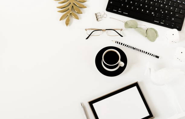 istock Creative home office desk workspace, composition mock up,  cup of coffee, keyboard, blanket,  eucalyptus branches, different subjects on white background. Flat lay, top view.Copy space. 1037296304