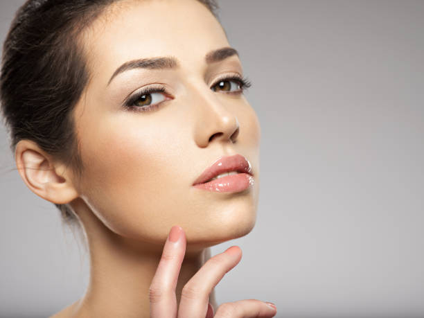 istock Beautiful woman face 1037300012