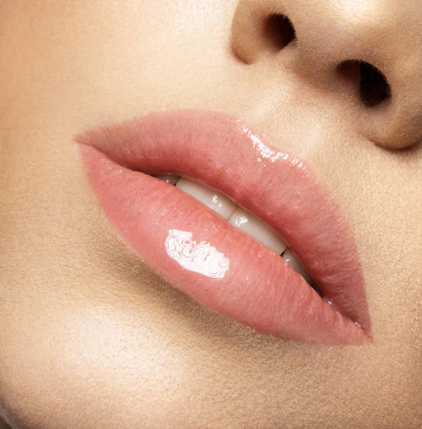 istock Close up macro photo with beautiful female lips 1037300040