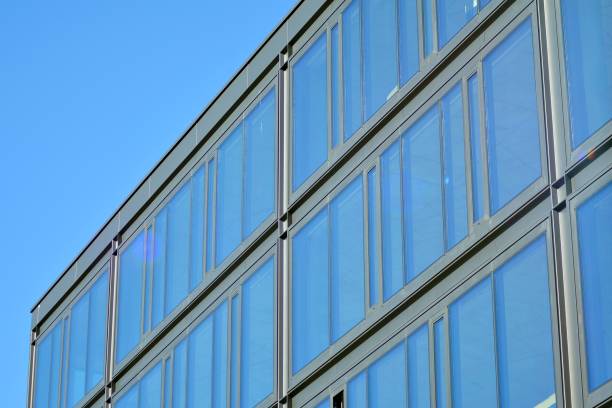 istock Glass curtain wall of modern office building 1037308010