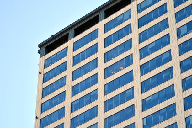 istock Glass curtain wall of modern office building 1037308284