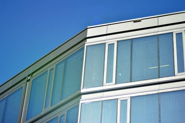 istock Glass curtain wall of modern office building 1037324284