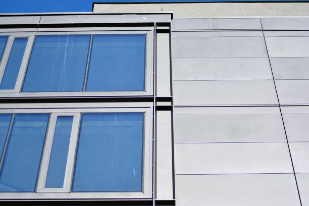 istock Glass curtain wall of modern office building 1037324404