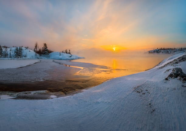 istock Winter dawn in the bay on the lake. 1037331222