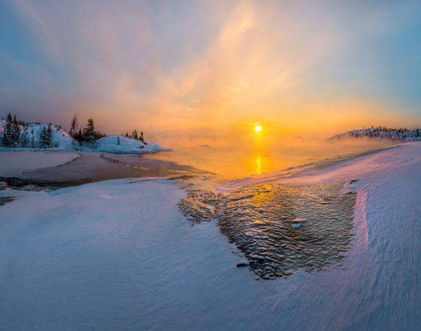 istock Winter dawn in the bay on the lake. 1037333788