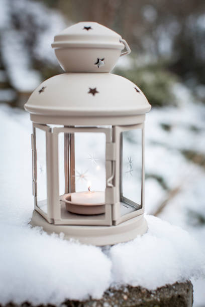 istock Winter Deco Lantern on wooden background 1037338830