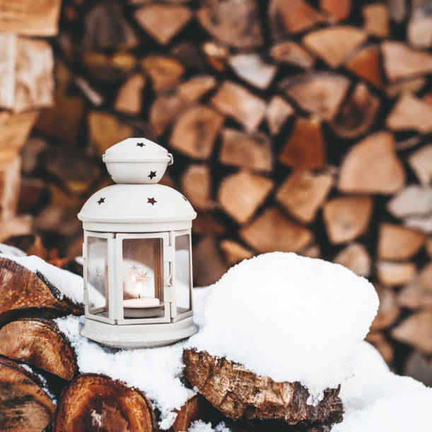 istock Winter Deco Lantern on wooden background 1037338992