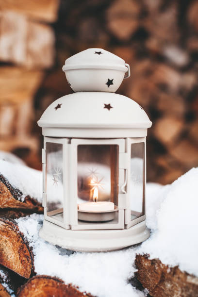 istock Winter Deco Lantern on wooden background 1037339036