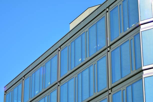istock Glass curtain wall of modern office building 1037339382