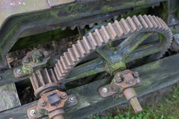 istock Old rusty gears. Gear wheels in agricultural equipment. 1037345256