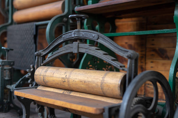 Old mangle for housework. Devices that facilitate housework in an old house. Season of the spring.
