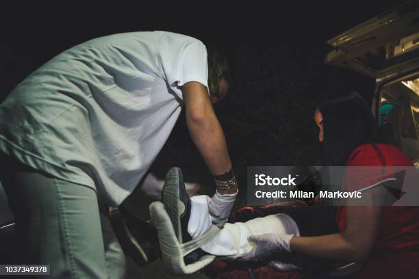 Paramedic Team Stock Photo - Download Image Now - A Helping Hand, Accidents and Disasters, Adult