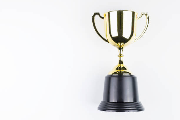 istock Golden trophy isolated on white background with space for your message.Concept winner. 1037350034