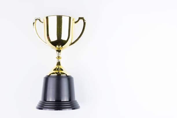 istock Golden trophy isolated on white background with space for your message.Concept winner. 1037350038