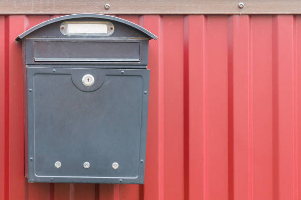 istock A beautiful mailbox hangs waiting for newspapers, parcels and letters. 1037352972