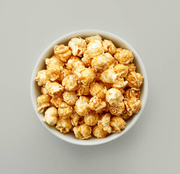 istock bowl of caramel popcorn 1037353864